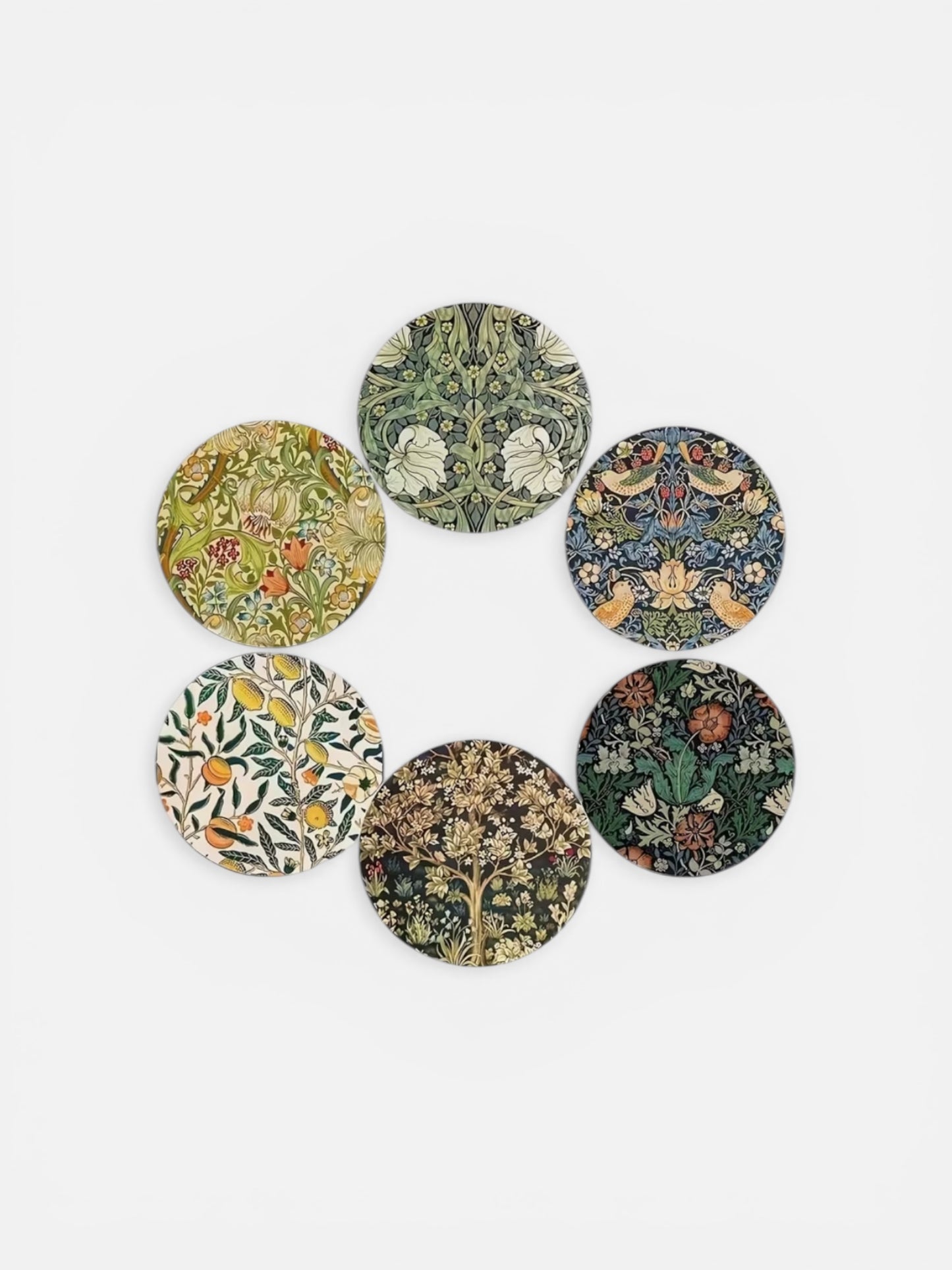 Set of six circular coasters with floral and nature-themed designs on a white background