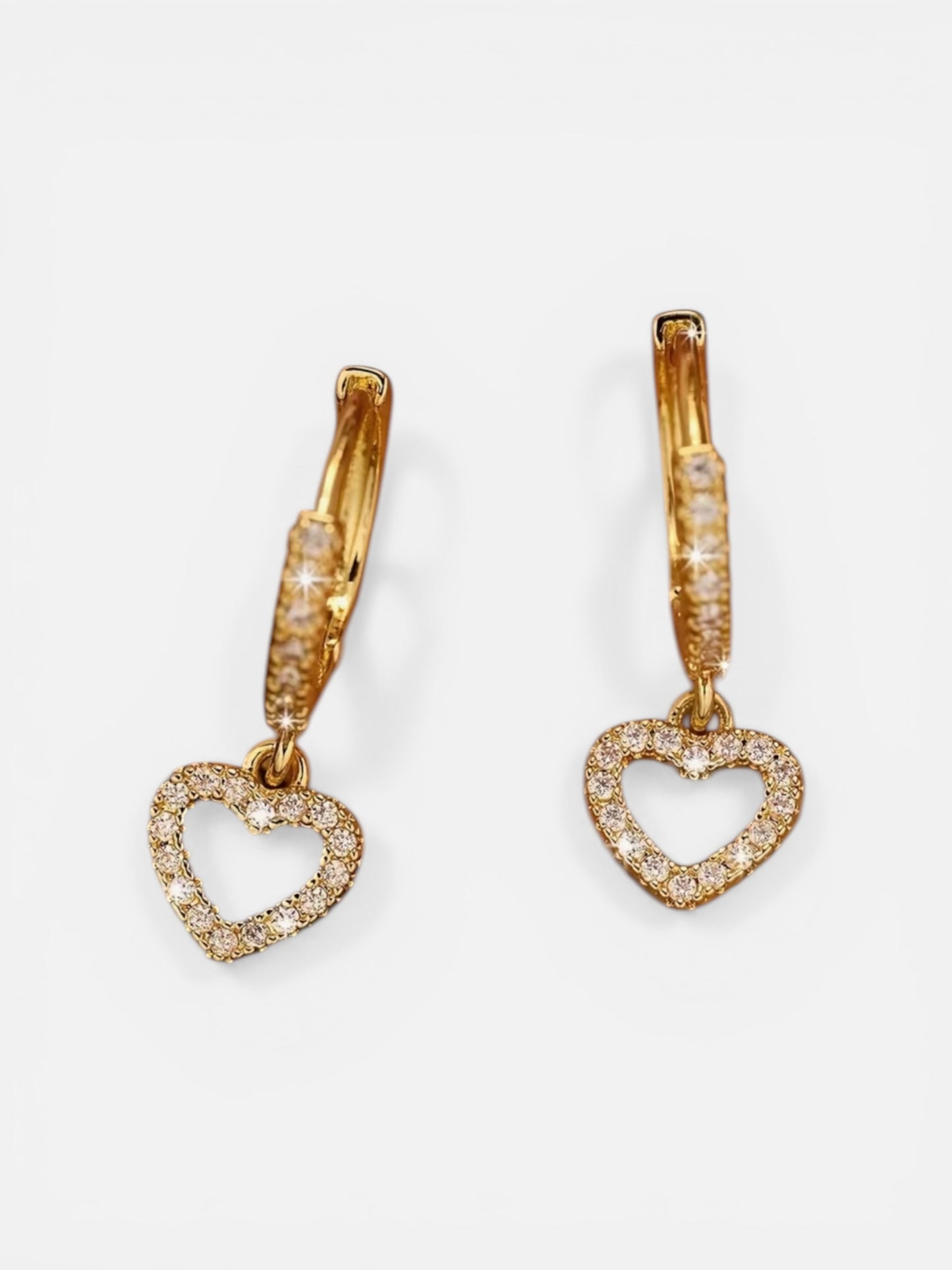 Charming gold sparkly heart earrings