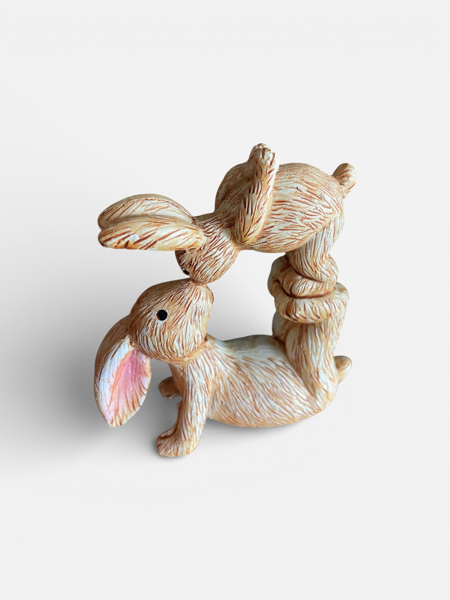 Decorative ceramic squirrel figurine on a white background