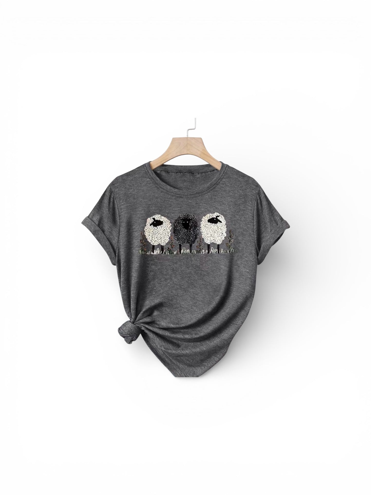 Gray t-shirt with owl design on a white background