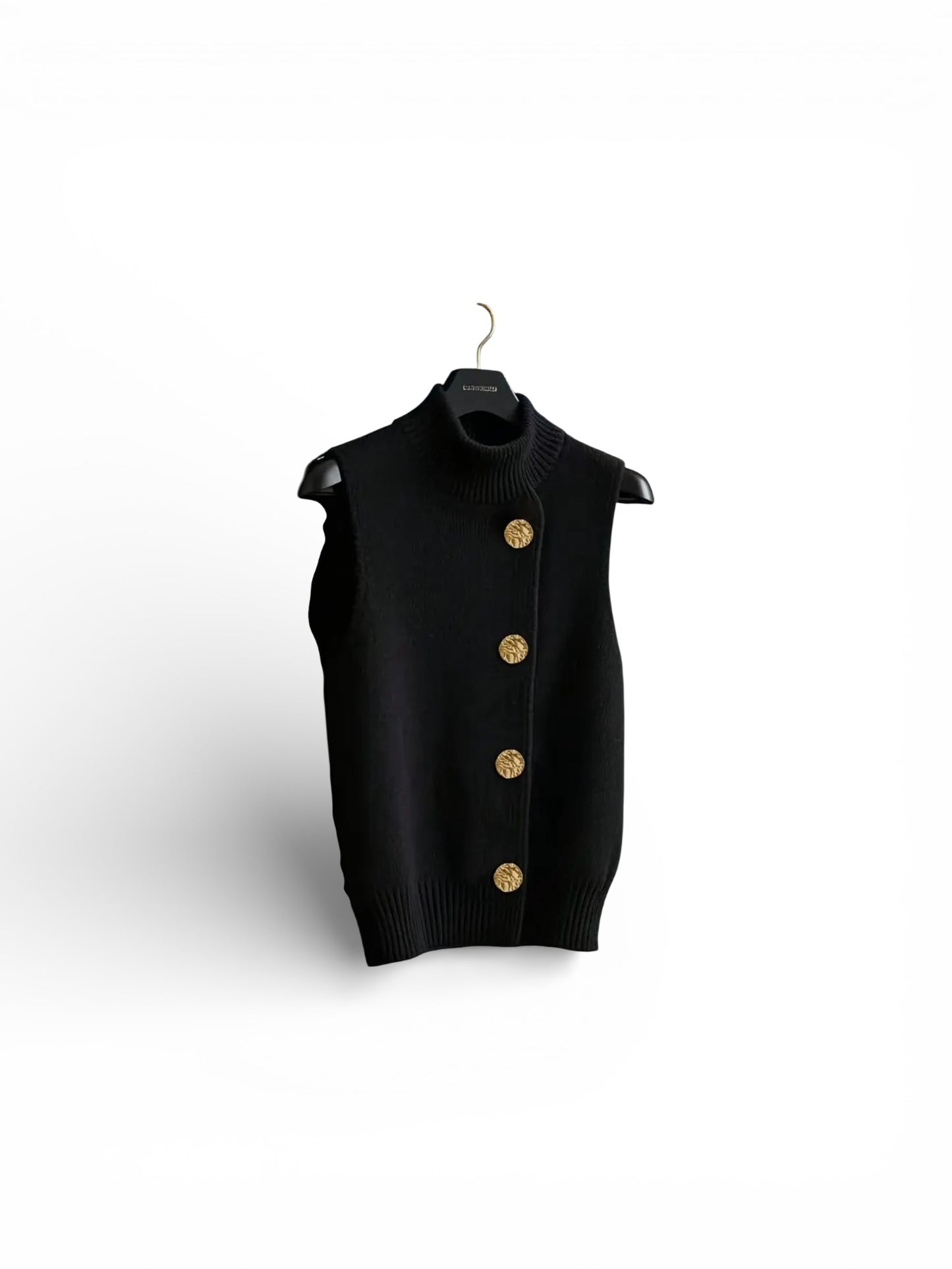 Black vest with gold buttons on a white background