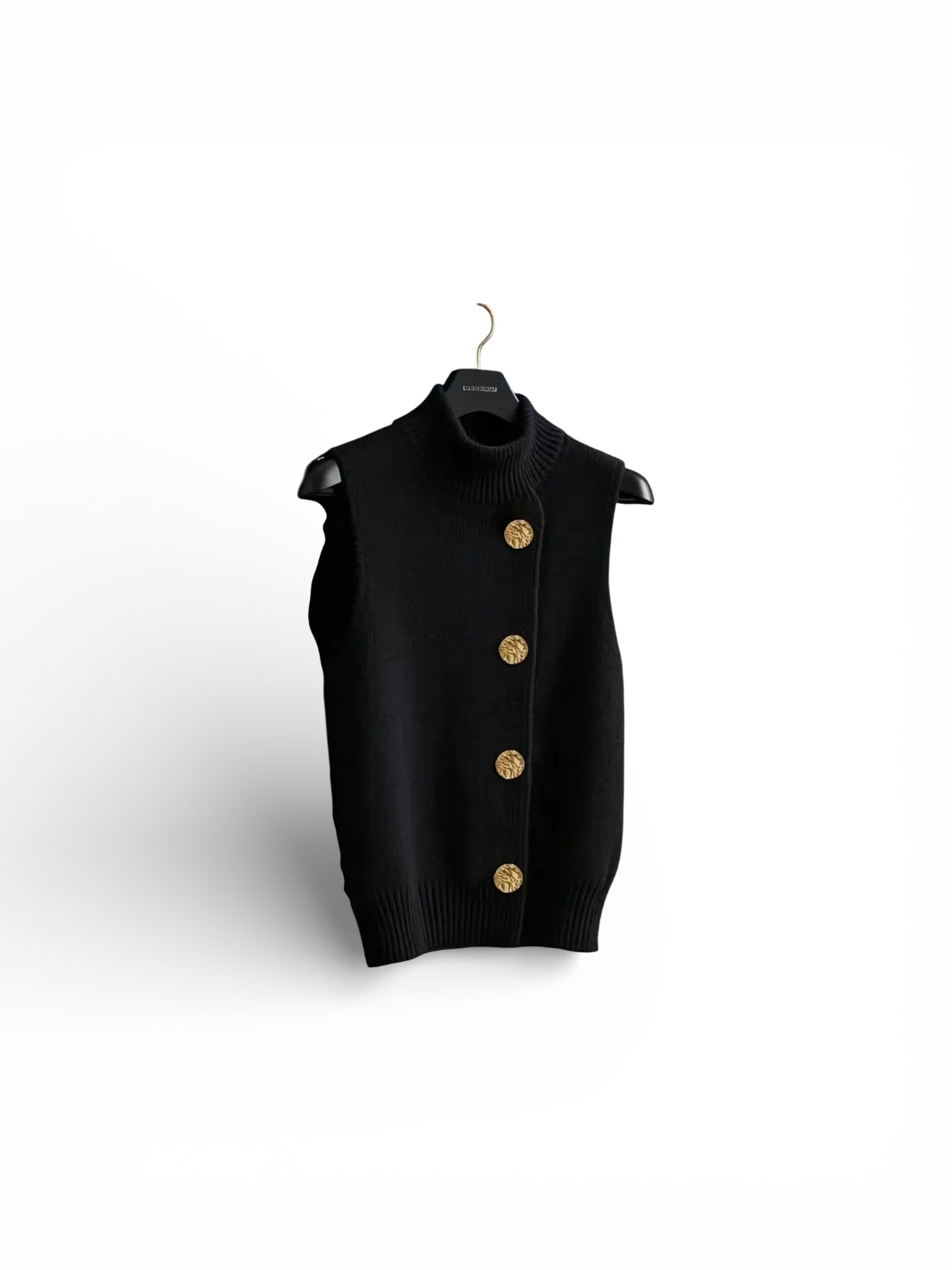 Black vest with gold buttons on a white background