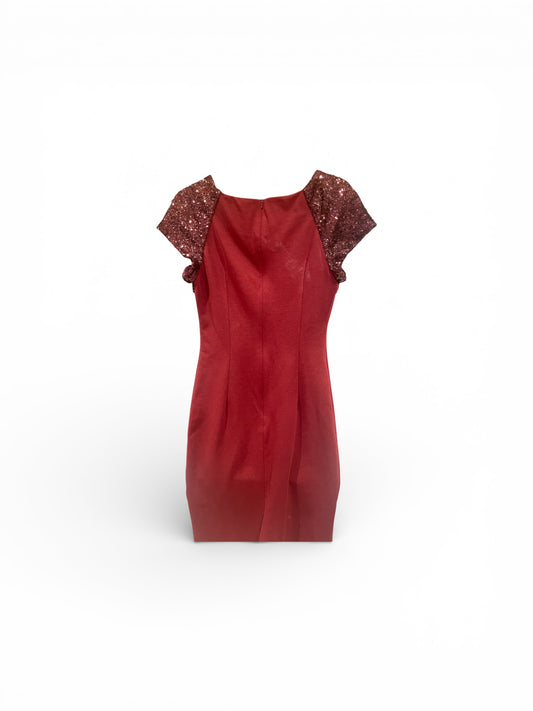 Red dress with sequin sleeves on a white background