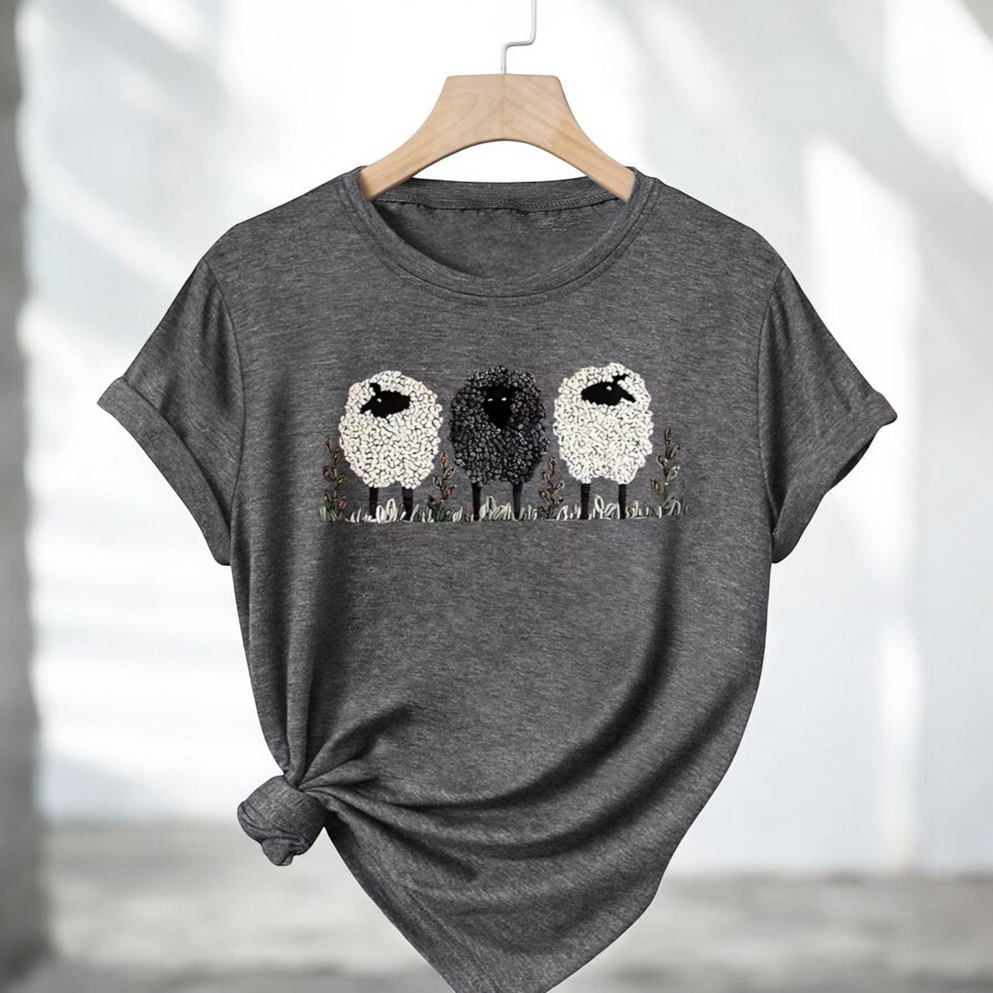 Gray t-shirt with a graphic of three sheep on a hanger against a white background