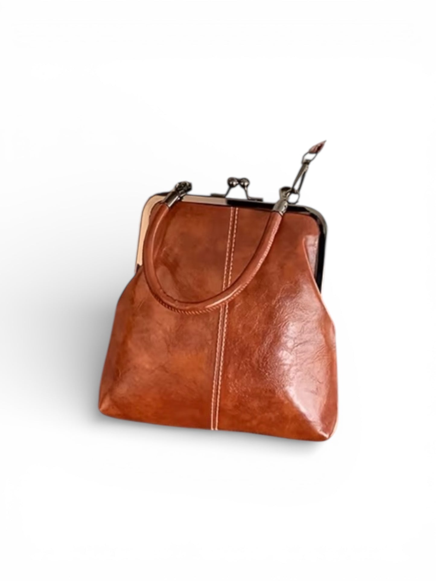 Brown leather handbag on a white background