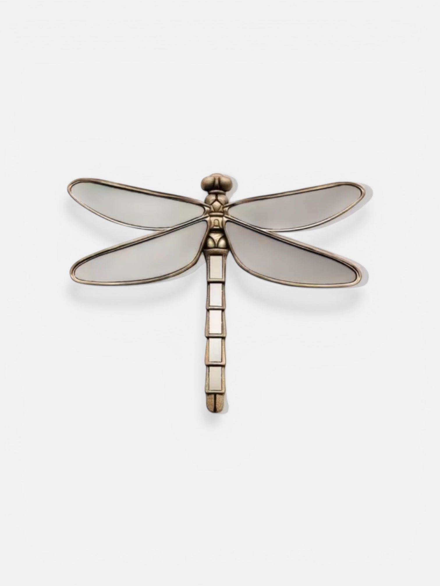 Decorative dragonfly-shaped object on a white background