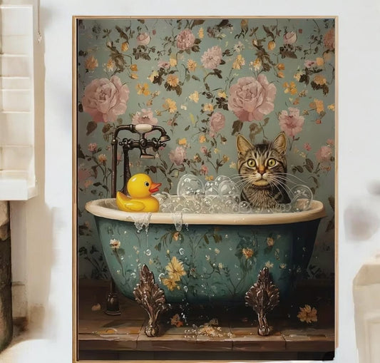 Framed artwork of a cat in a bathtub with a rubber duck against a floral background